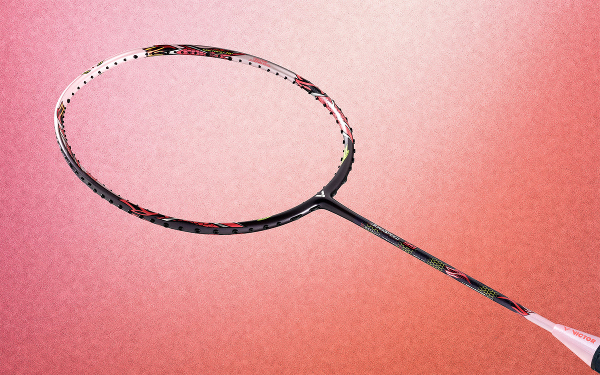Victor badminton racket on a red background